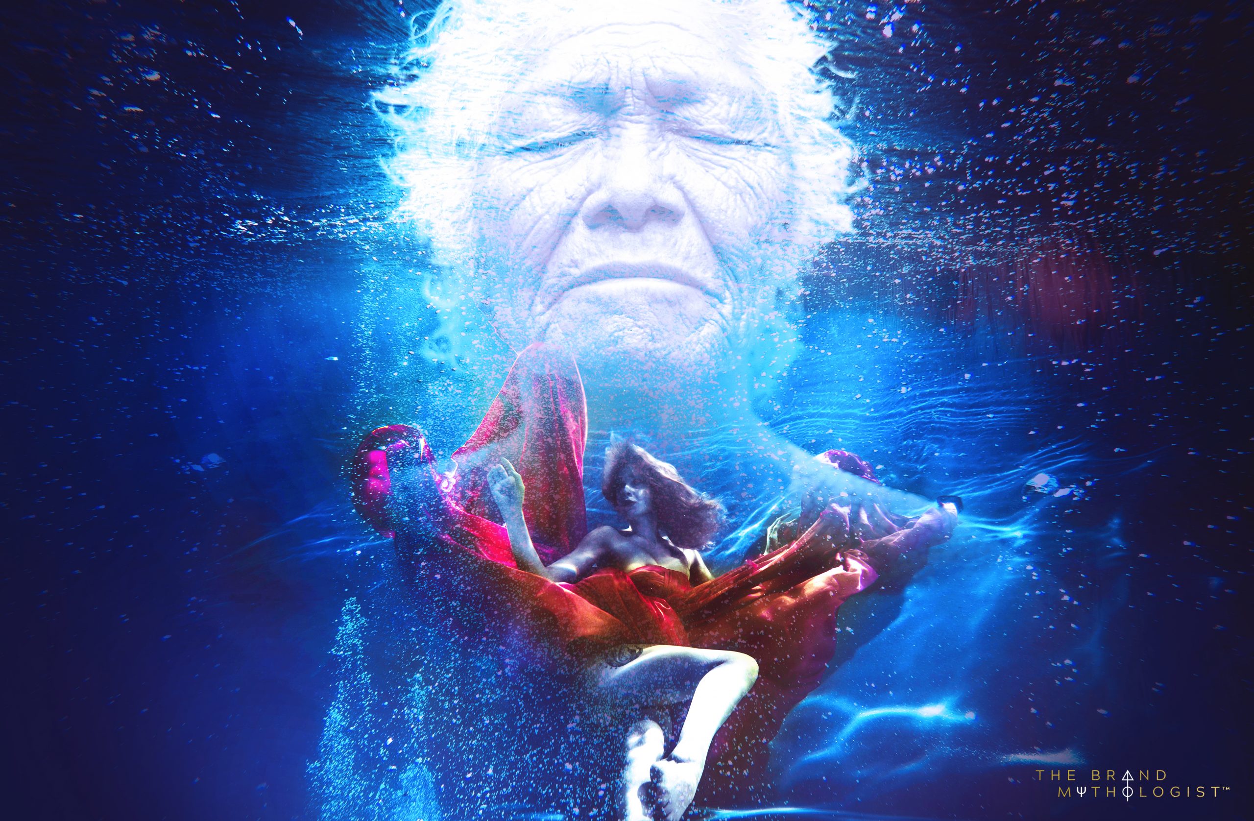 Beautiful woman swimming with fancy dress underwater